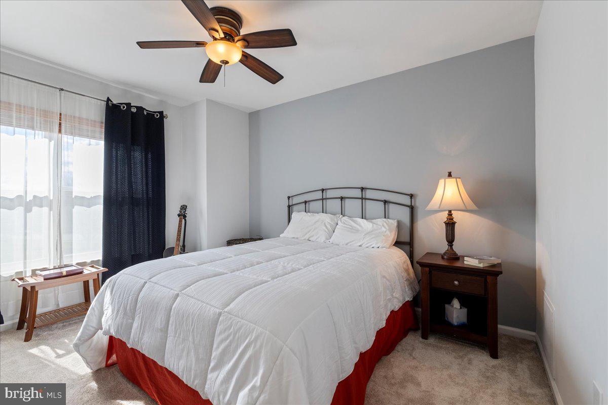 211 Barness Lane Chalfont, PA 18914 - Photo 17 of 32 a bedroom with a bed and a window