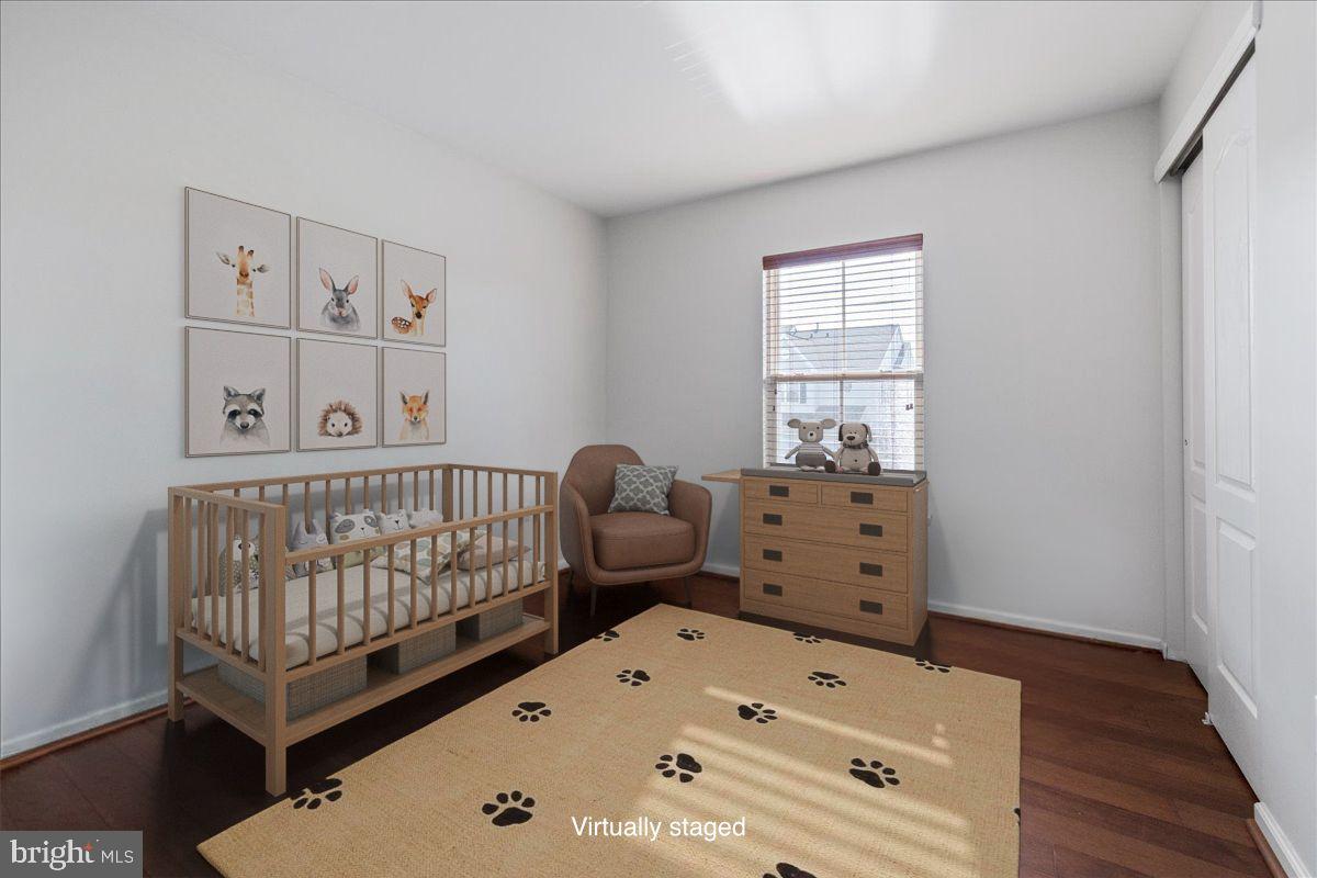 211 Barness Lane Chalfont, PA 18914 - Photo 18 of 32 a bedroom with a bed and wooden floor
