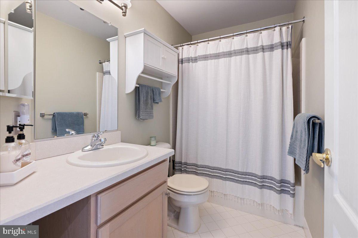 211 Barness Lane Chalfont, PA 18914 - Photo 19 of 32 a bathroom with a sink a toilet and shower