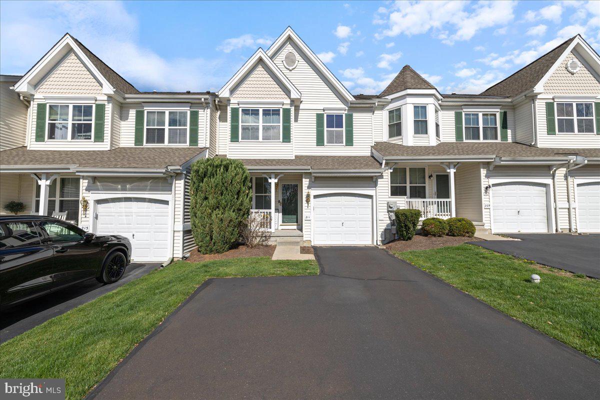 211 Barness Lane Chalfont, PA 18914 - Photo 31 of 32 a front view of a house with a garden