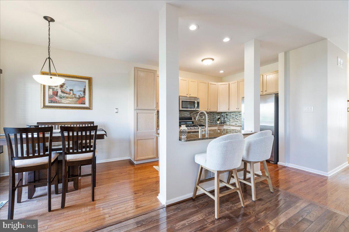 211 Barness Lane Chalfont, PA 18914 - Photo 32 of 32 a view of a dining room with furniture and wooden floor