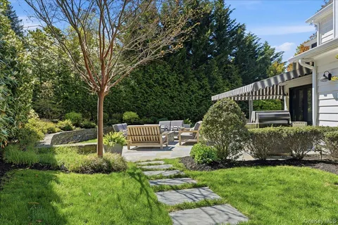 a garden view with a seating space