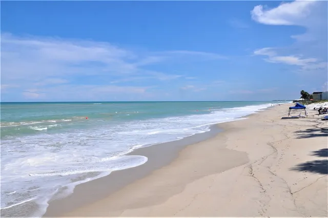 a view of beach and ocean