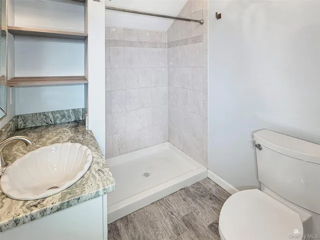 a view of a room with racks on the wall