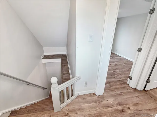 a bathroom with a sink a toilet and bathtub