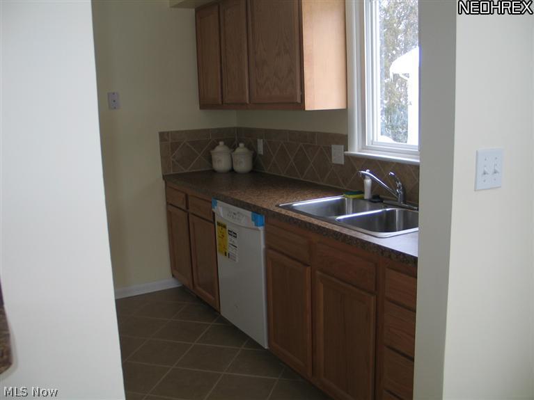 2497 Haverhill Road Akron, OH 44333 - Photo 4 of 7 New Dishwasher, countertops and dishwasher.