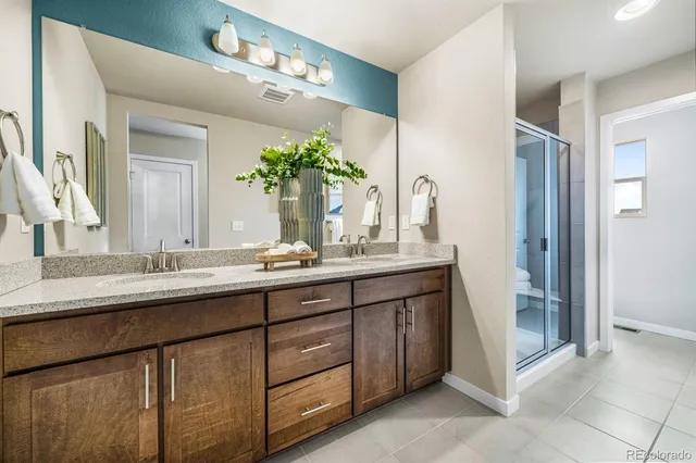 a bathroom with a shower and toilet