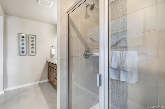 a view of a refrigerator in kitchen
