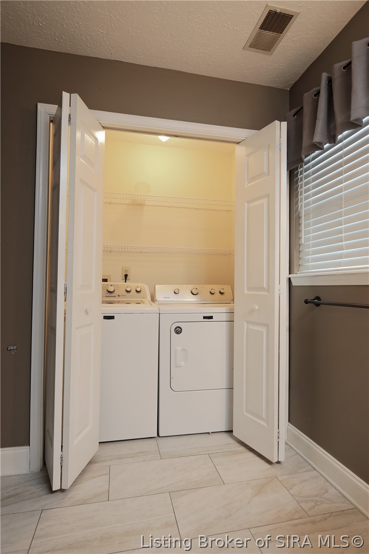 1329 Valley View Road New Albany, IN 47150 - Photo 28 of 40 Laundry in primary bathroom