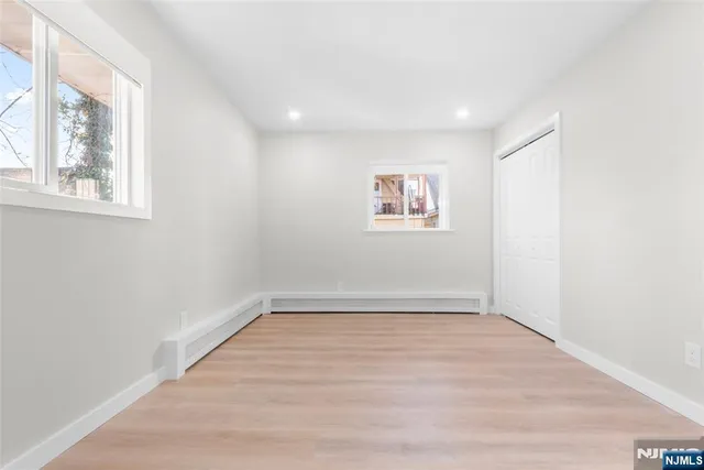 a view of empty room with windows