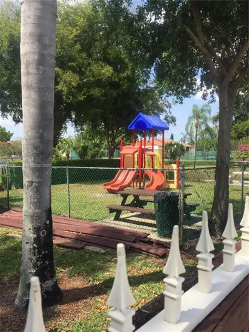 a view of a bench in a garden