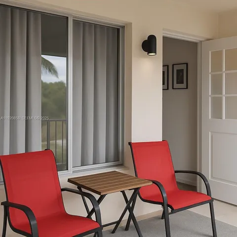 a view of a room with furniture and wooden floor