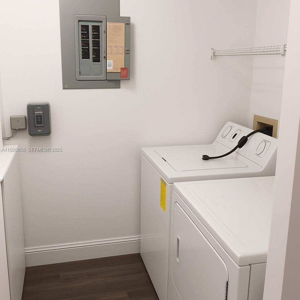 4717 Sable Pine Circle, Unit A2 West Palm Beach, FL 33417 - Photo 7 of 15 a utility room with dryer and washer