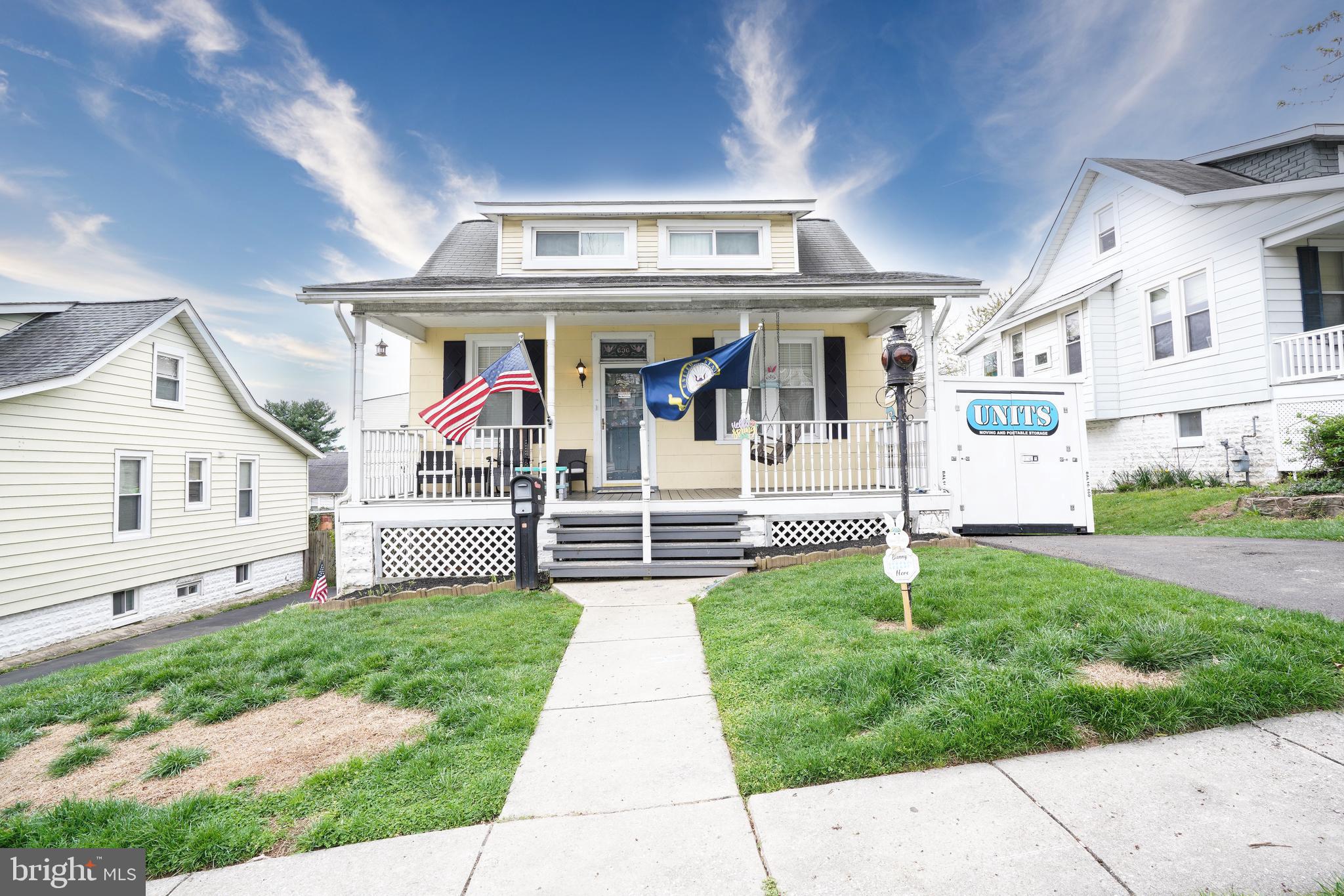 636 North Bend Road Baltimore, MD 21229 - Photo 1 of 26 a front view of a house with a yard