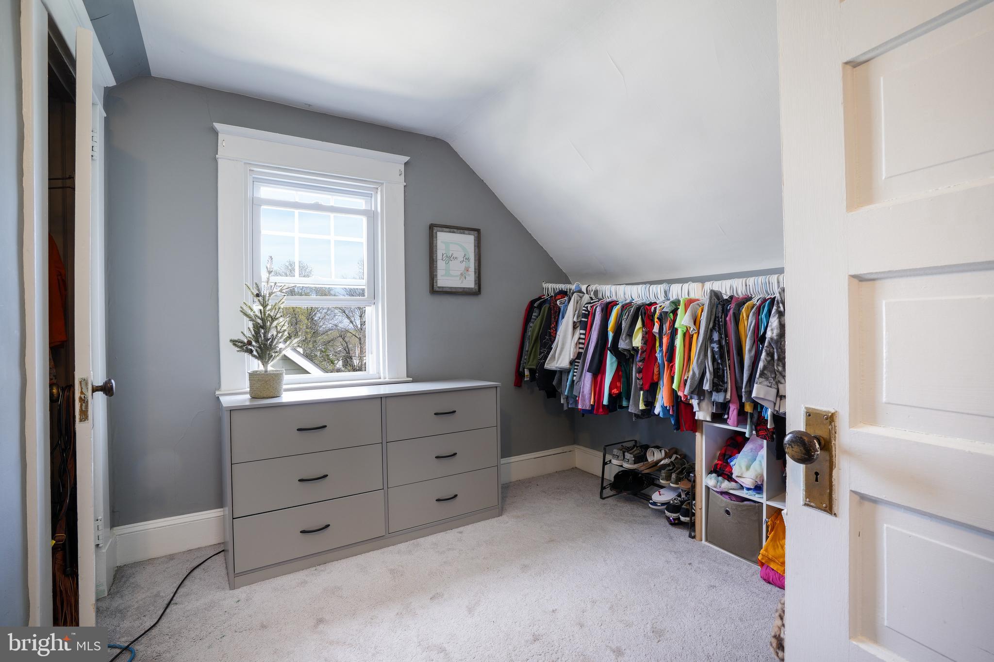 636 North Bend Road Baltimore, MD 21229 - Photo 15 of 26 a view of walk in closet with clothes and shoes