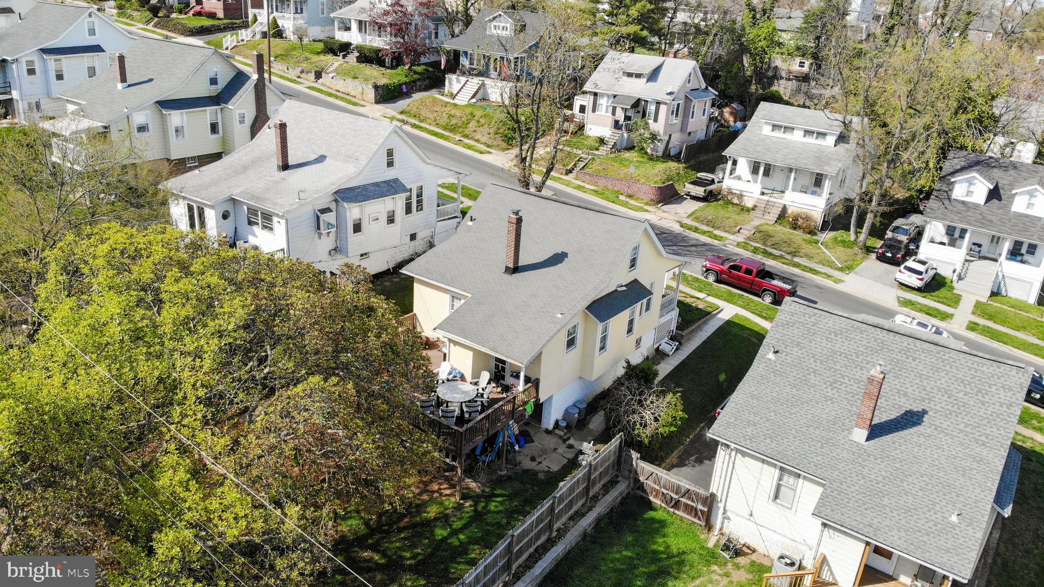 636 North Bend Road Baltimore, MD 21229 - Photo 25 of 26 an aerial view of multiple houses with yard