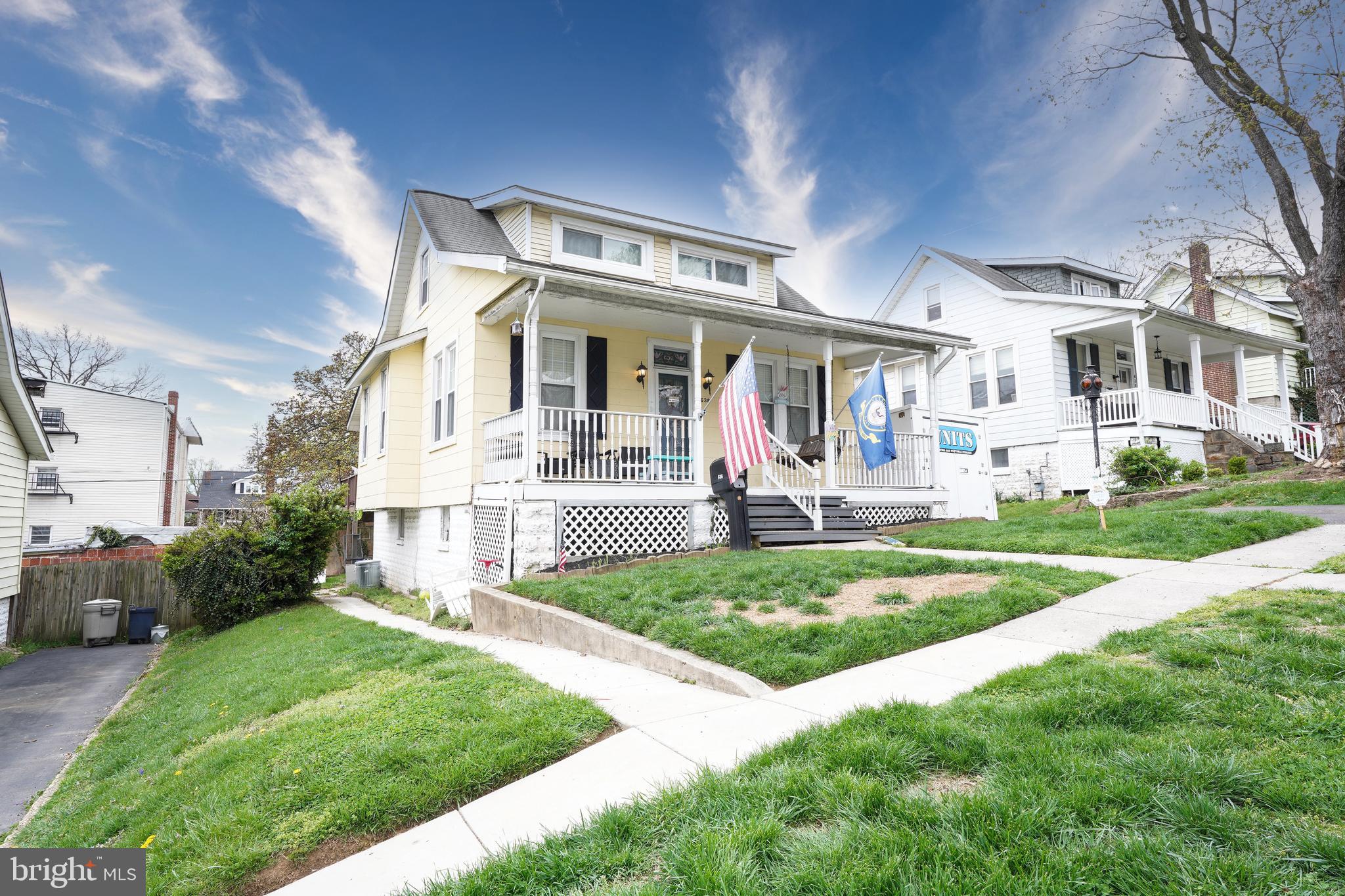 636 North Bend Road Baltimore, MD 21229 - Photo 3 of 26 a front view of house with yard and outdoor seating