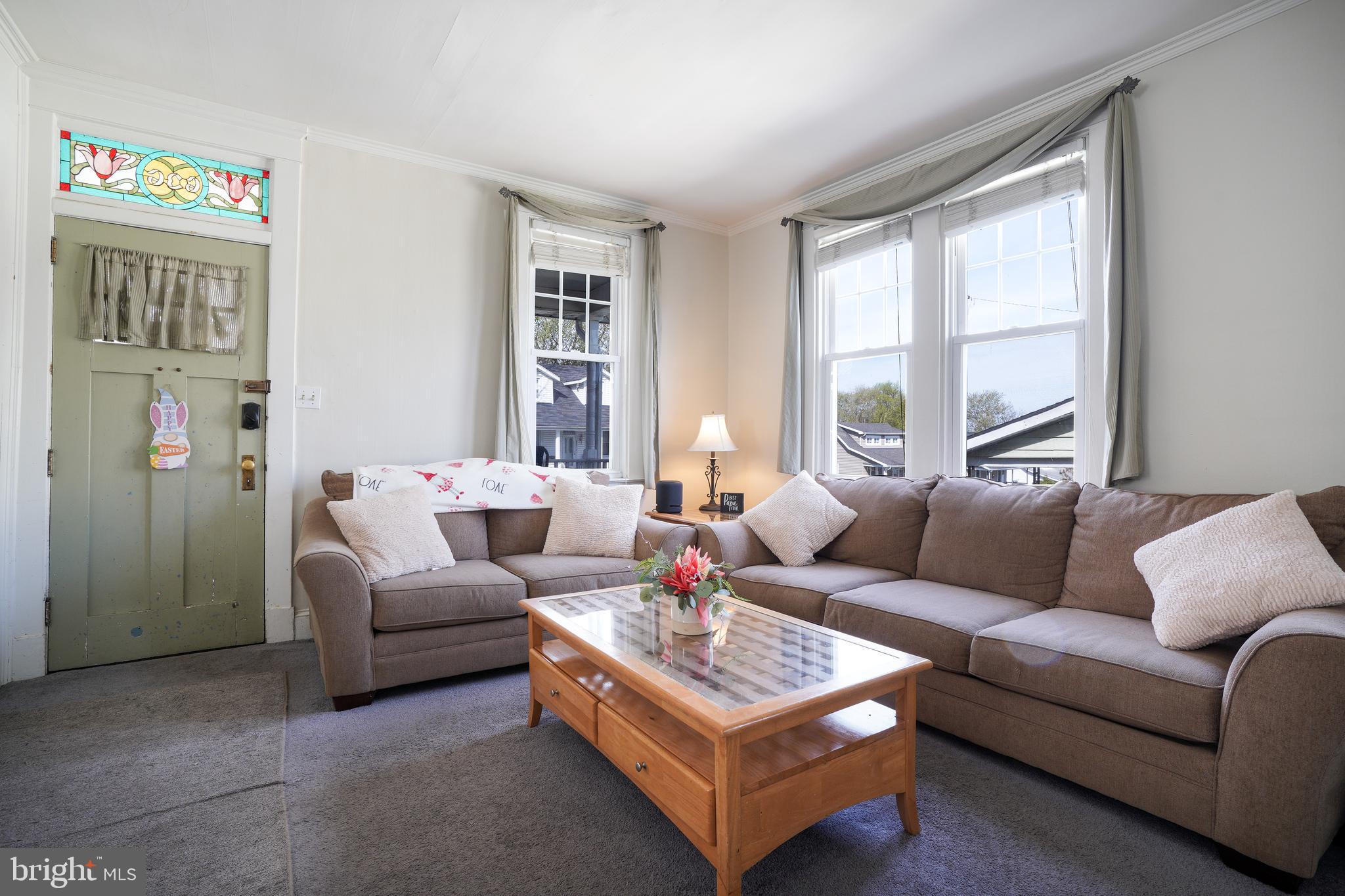 636 North Bend Road Baltimore, MD 21229 - Photo 5 of 26 a living room with furniture and a window