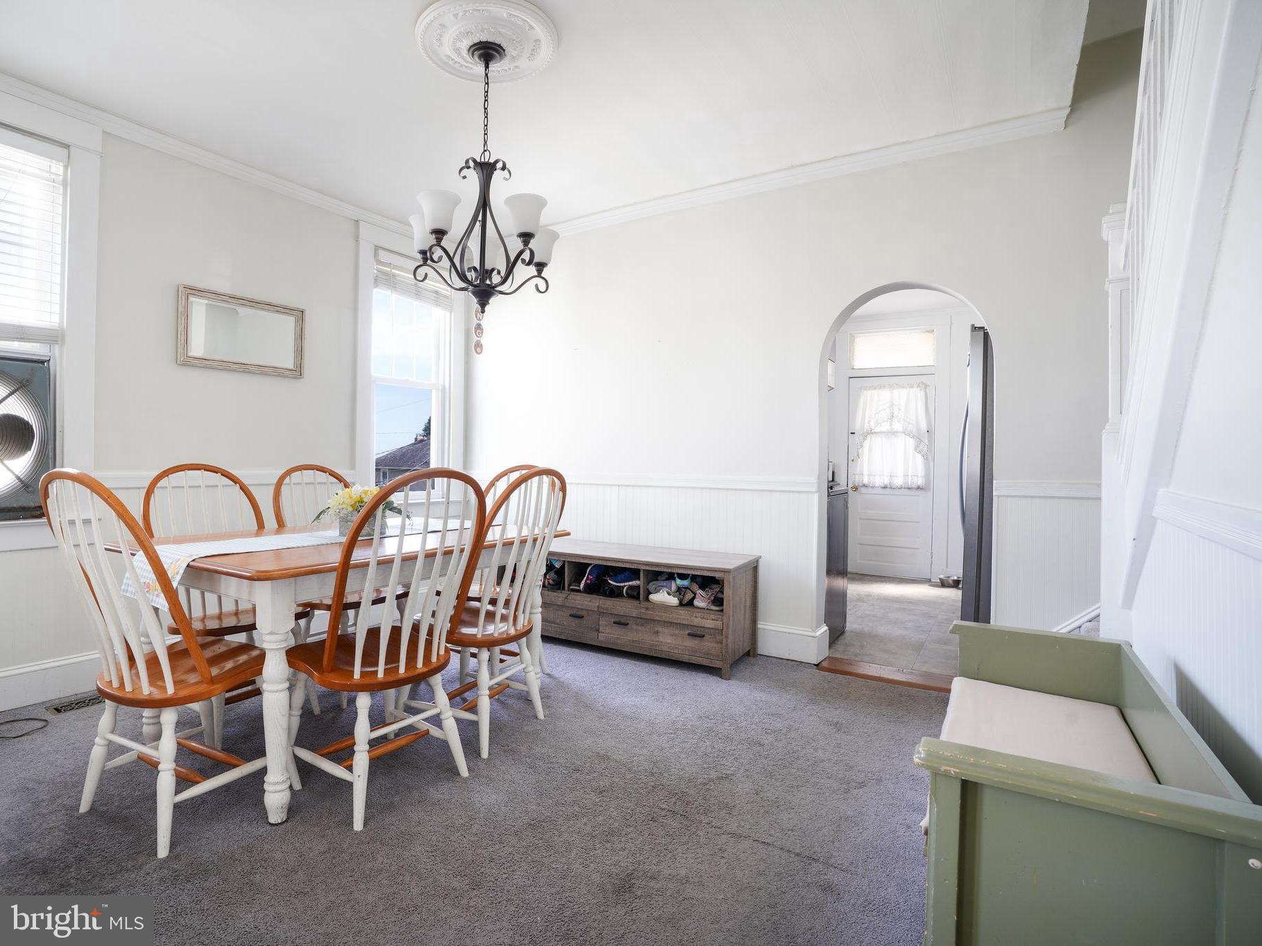 636 North Bend Road Baltimore, MD 21229 - Photo 7 of 26 a view of a dining room with furniture window and outside view