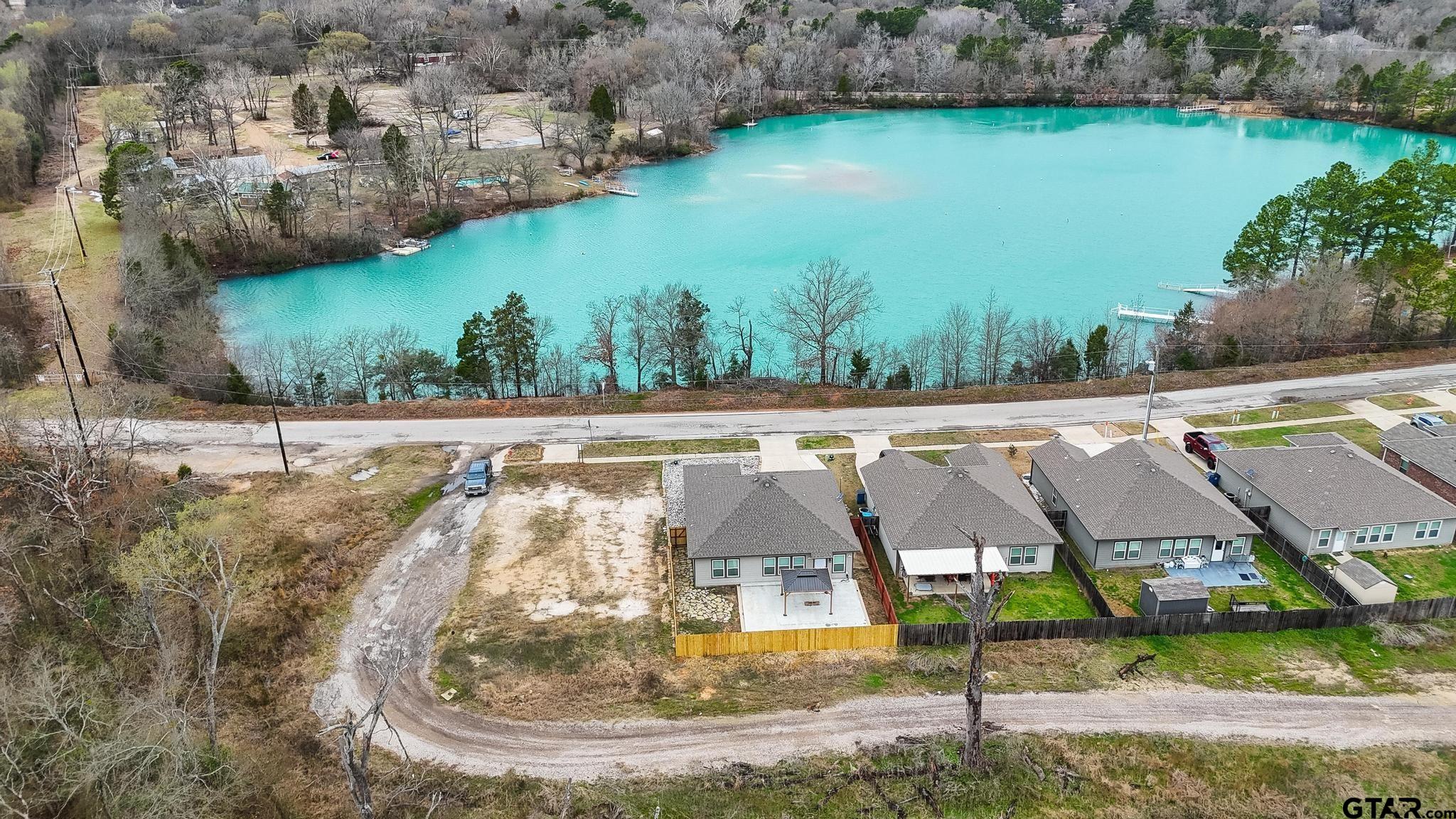 602 North Wofford Street Athens, TX 75751 - Photo 6 of 34 an aerial view of a house with a yard and lake view