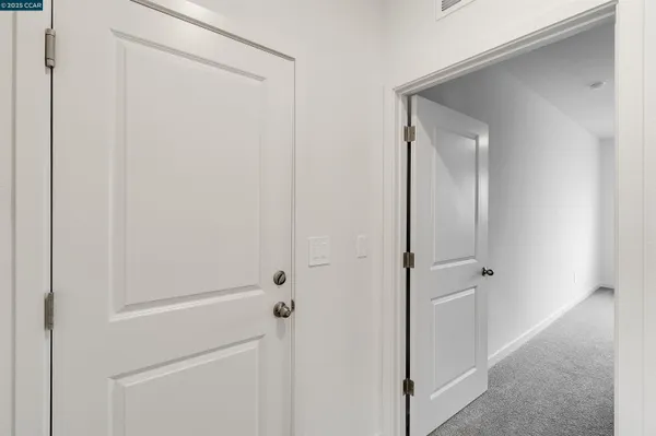 a bathroom with a sink toilet vanity and shower