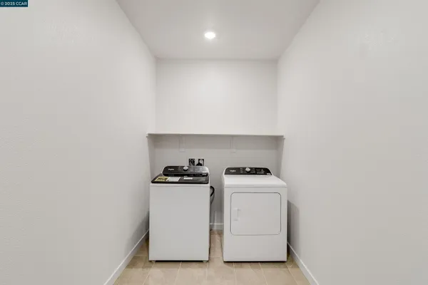 an empty room with closet area