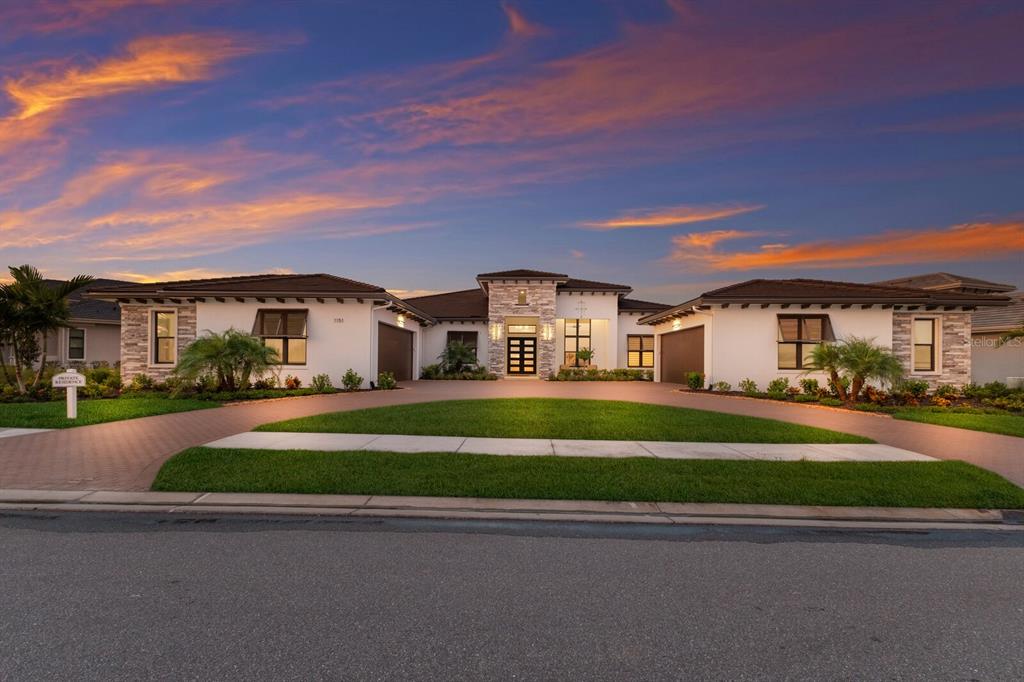 front view of a house and a yard
