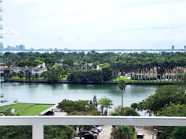 an aerial view of residential building lake and houses