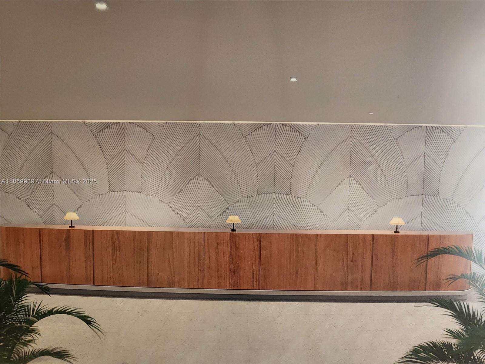 5555 Collins Avenue, Unit 9S Miami Beach, FL 33140 - Photo 17 of 48 a view of walk in closet