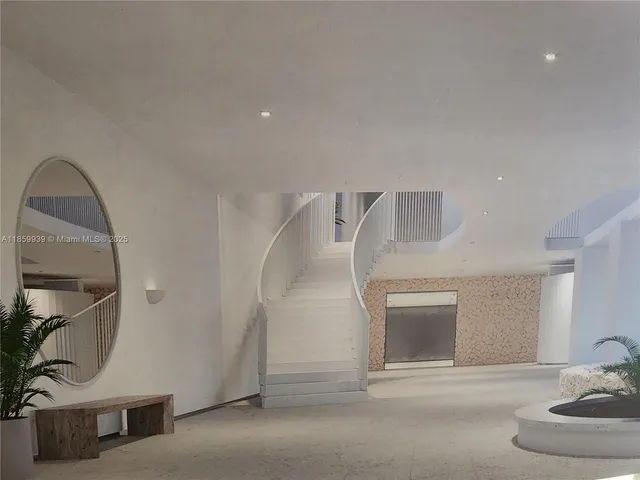 a view of entryway and kitchen