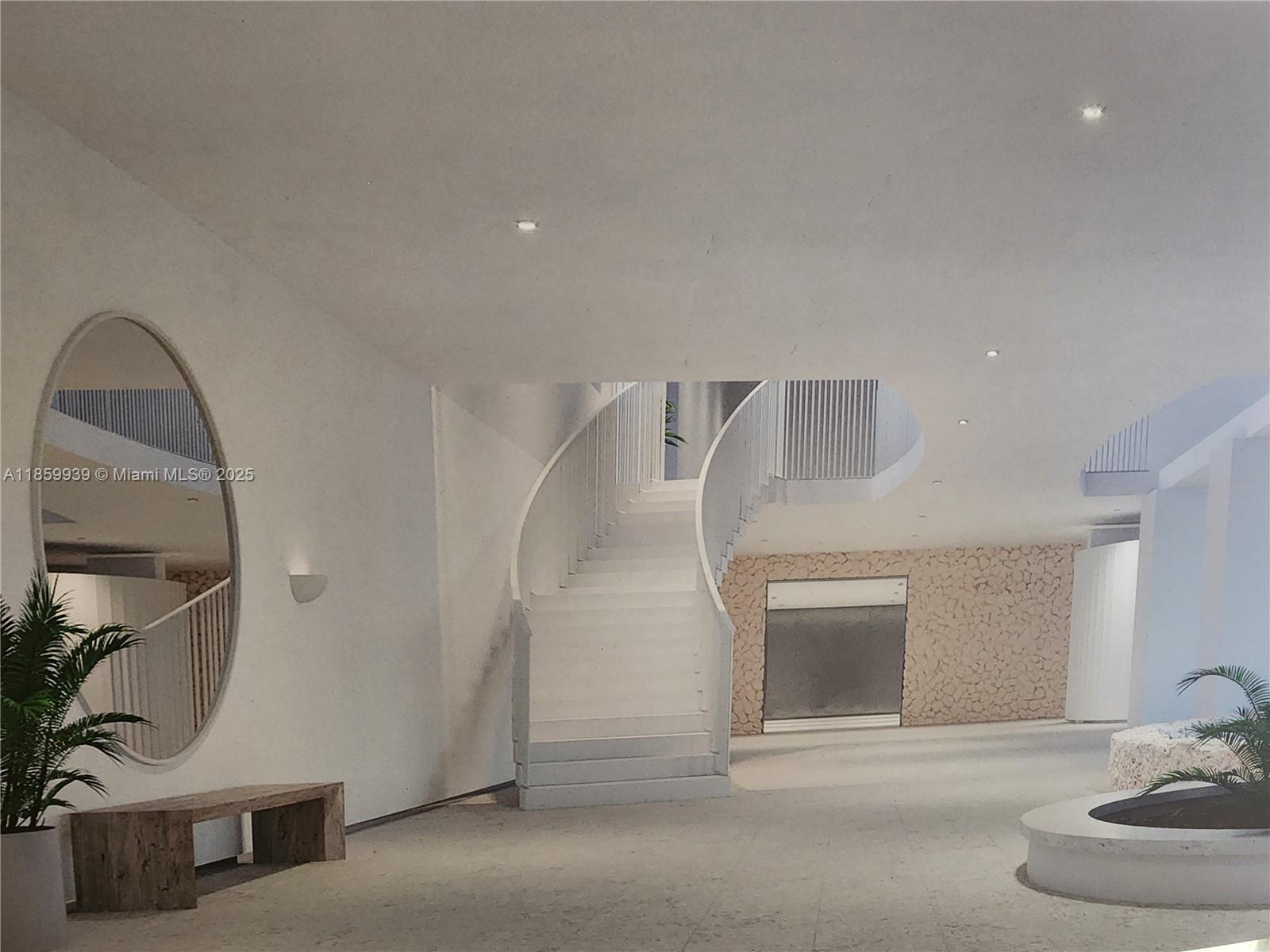 5555 Collins Avenue, Unit 9S Miami Beach, FL 33140 - Photo 19 of 48 a view of entryway and kitchen