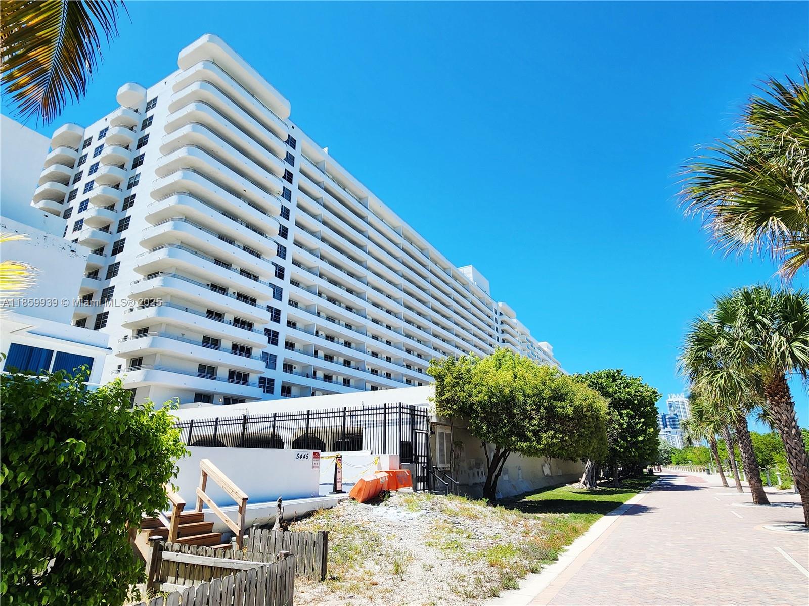 5555 Collins Avenue, Unit 9S Miami Beach, FL 33140 - Photo 2 of 48 a building view with outdoor space