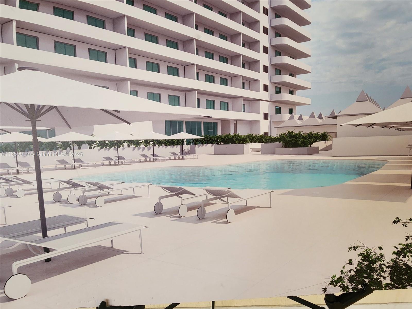 5555 Collins Avenue, Unit 9S Miami Beach, FL 33140 - Photo 22 of 48 a front view of a building with lake view