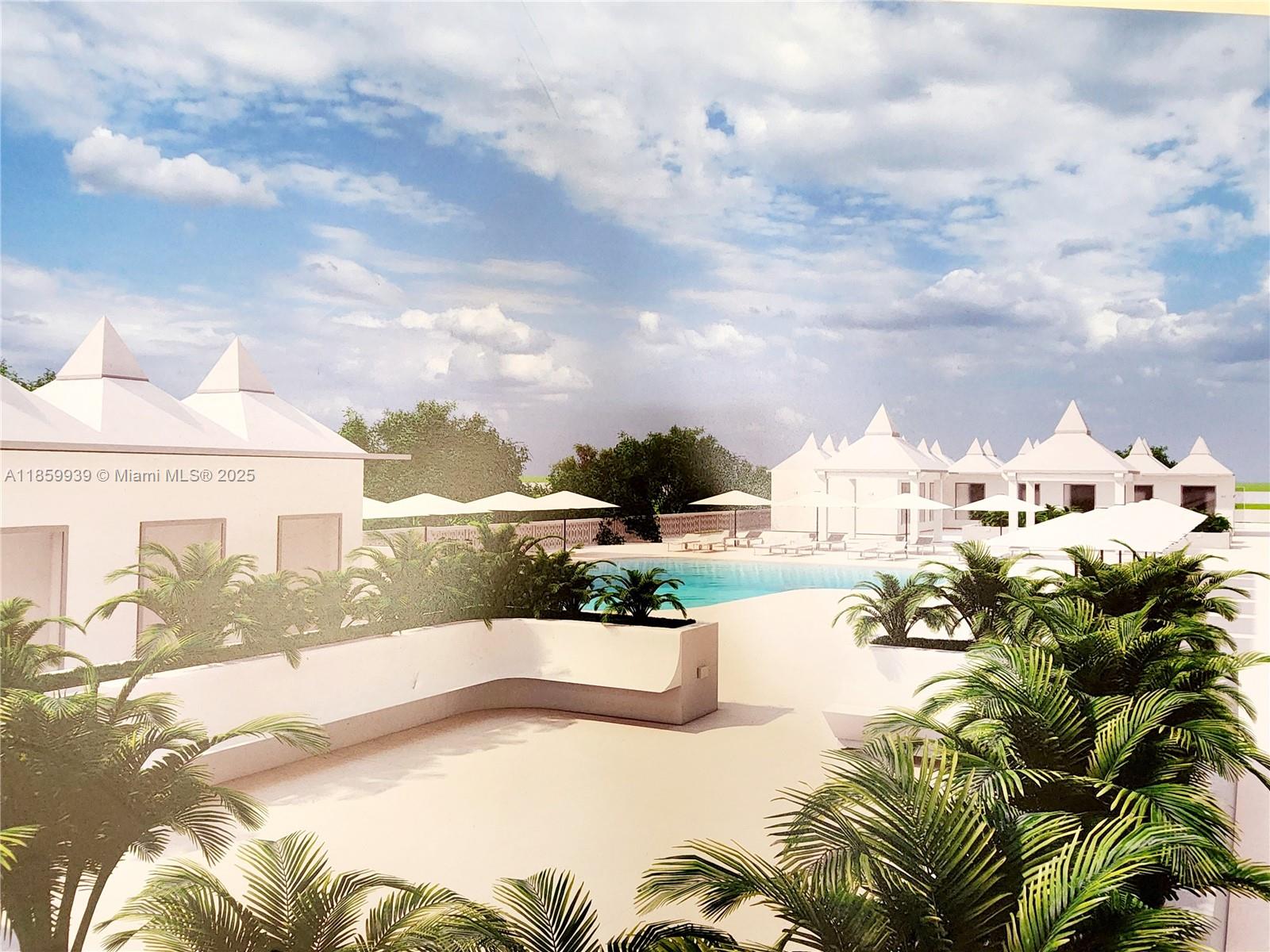 5555 Collins Avenue, Unit 9S Miami Beach, FL 33140 - Photo 26 of 48 a view of a swimming pool with a terrace