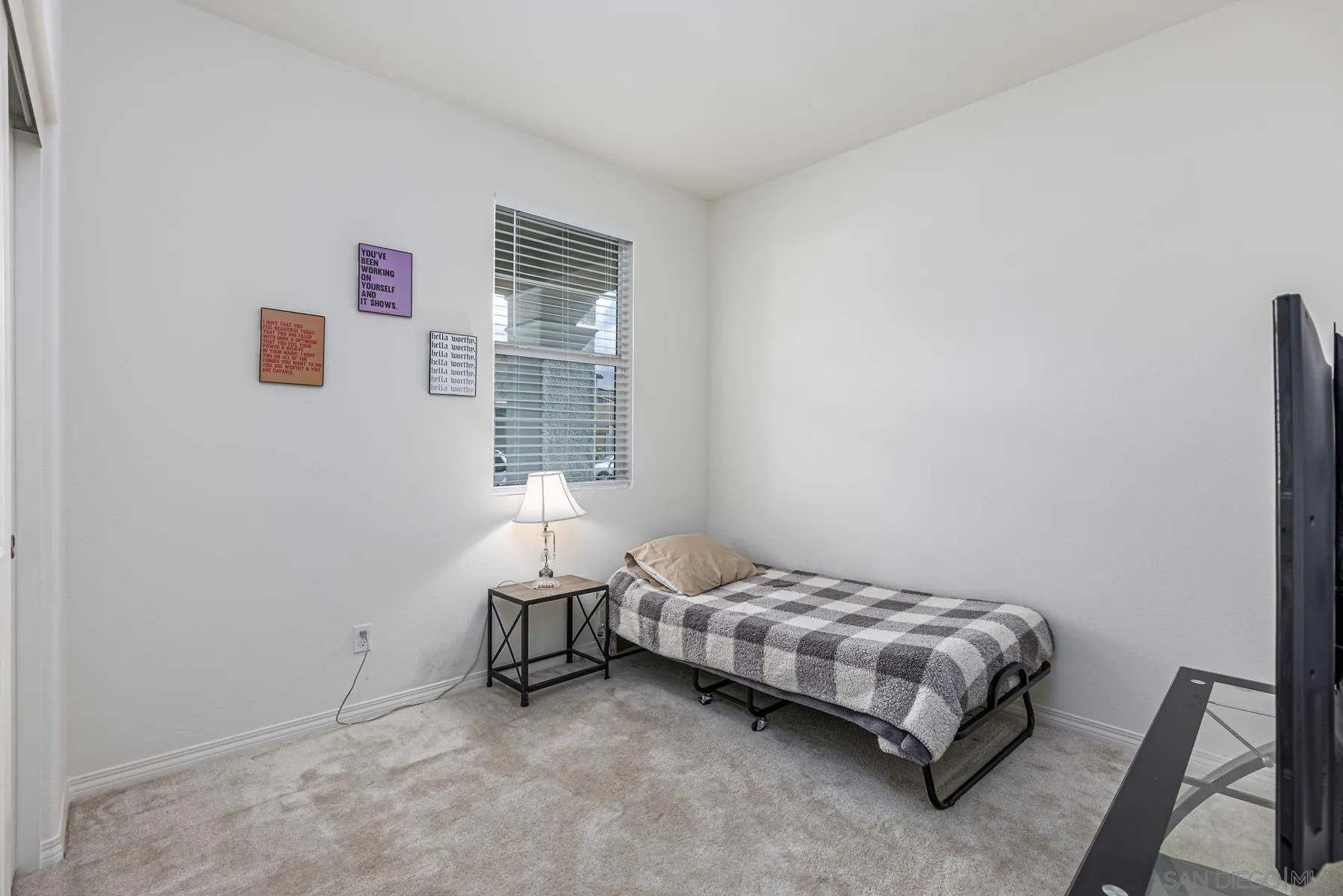 30903 Wild Berry Way Menifee, CA 92584 - Photo 11 of 37 a bedroom with a bed and a window