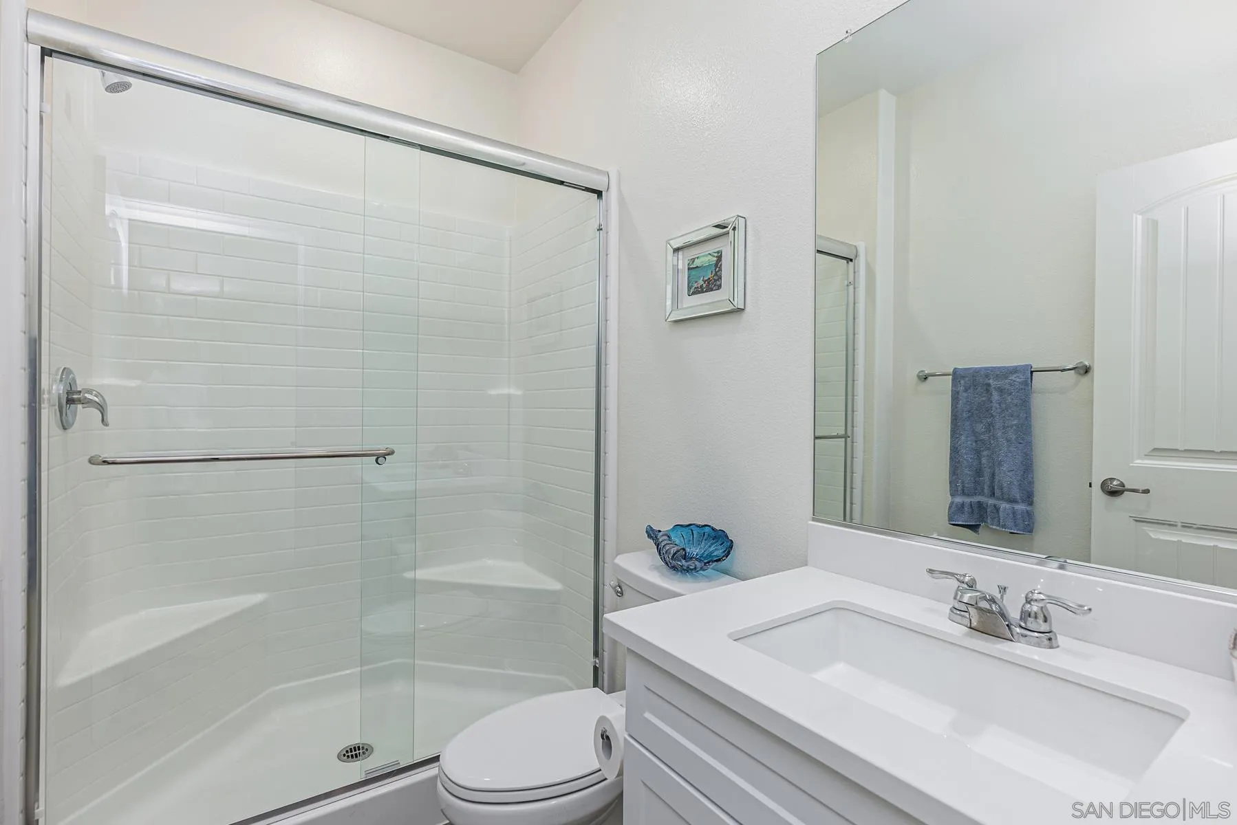 30903 Wild Berry Way Menifee, CA 92584 - Photo 12 of 37 a bathroom with a sink toilet and shower