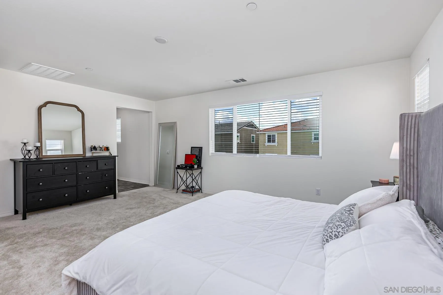 30903 Wild Berry Way Menifee, CA 92584 - Photo 15 of 37 a bedroom with a bed and a closet