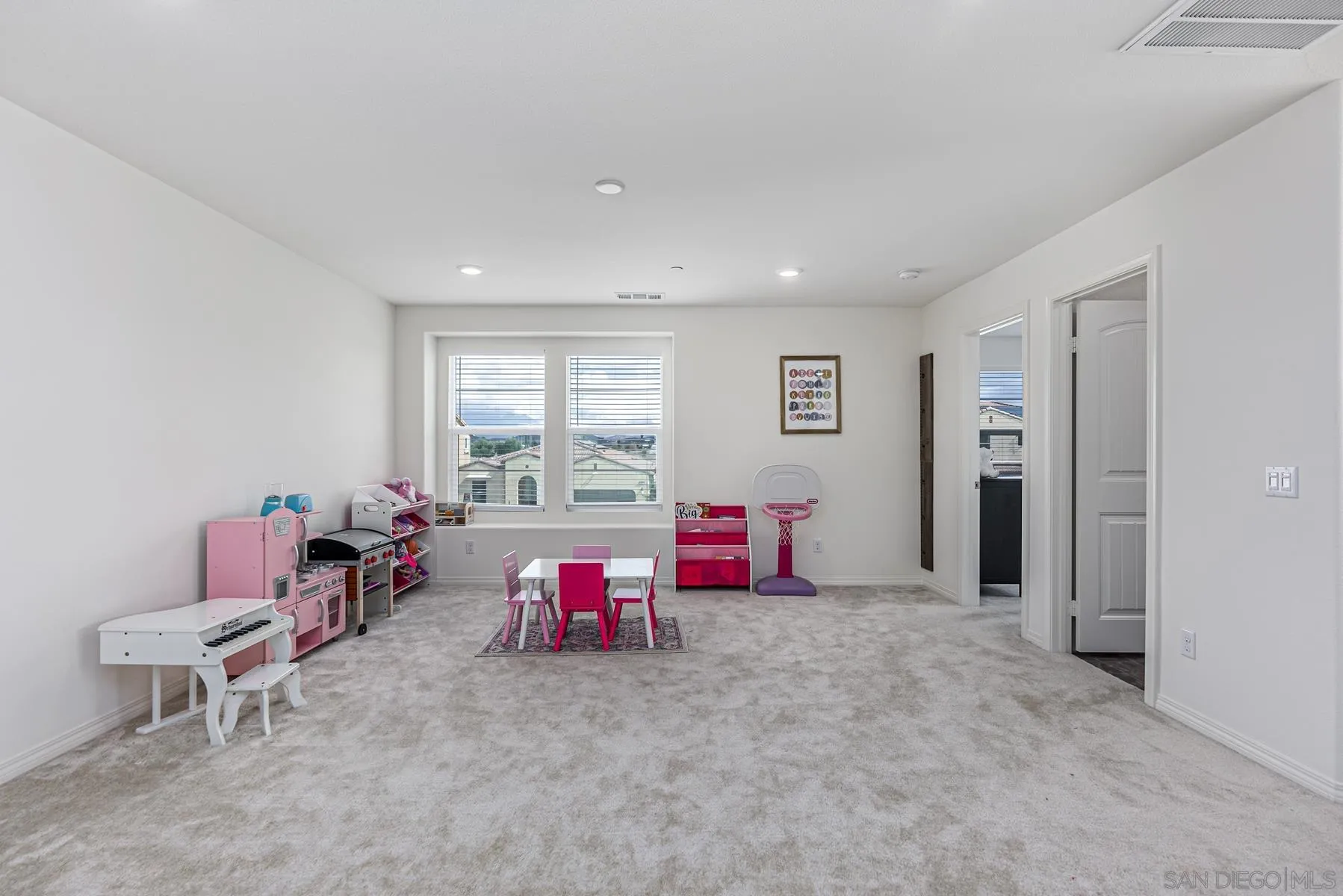 30903 Wild Berry Way Menifee, CA 92584 - Photo 20 of 37 a living room with furniture and a large window