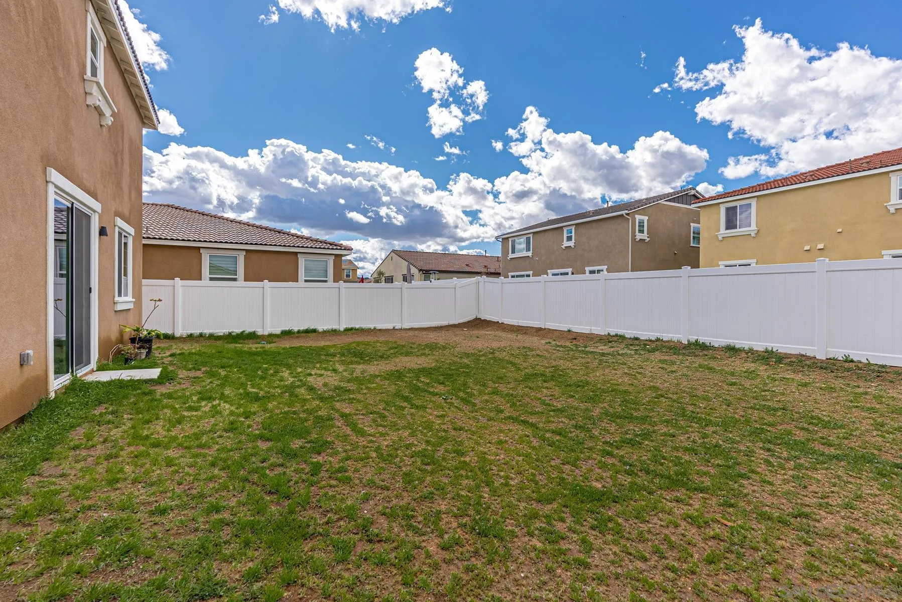 30903 Wild Berry Way Menifee, CA 92584 - Photo 25 of 37 a view of a house with a yard