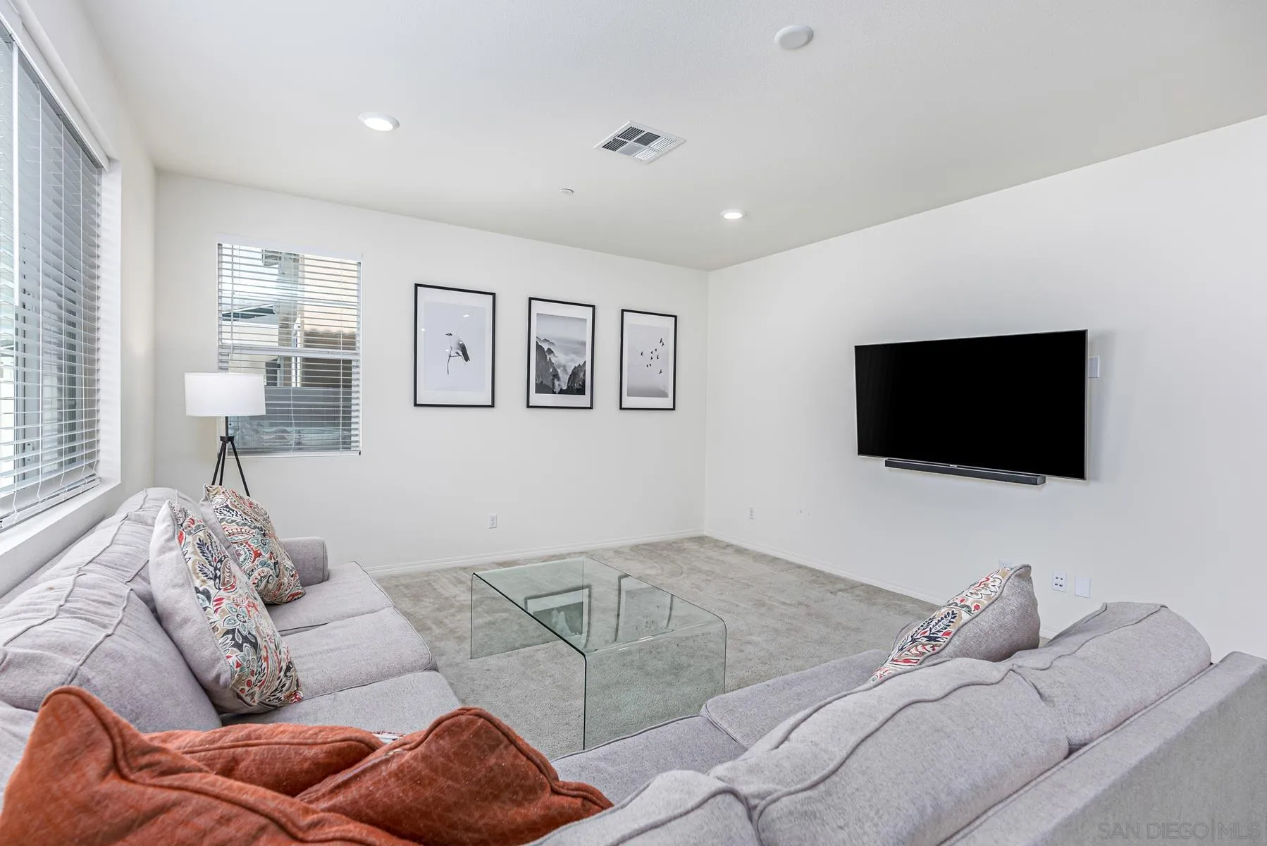 30903 Wild Berry Way Menifee, CA 92584 - Photo 3 of 37 a living room with furniture and a flat screen tv