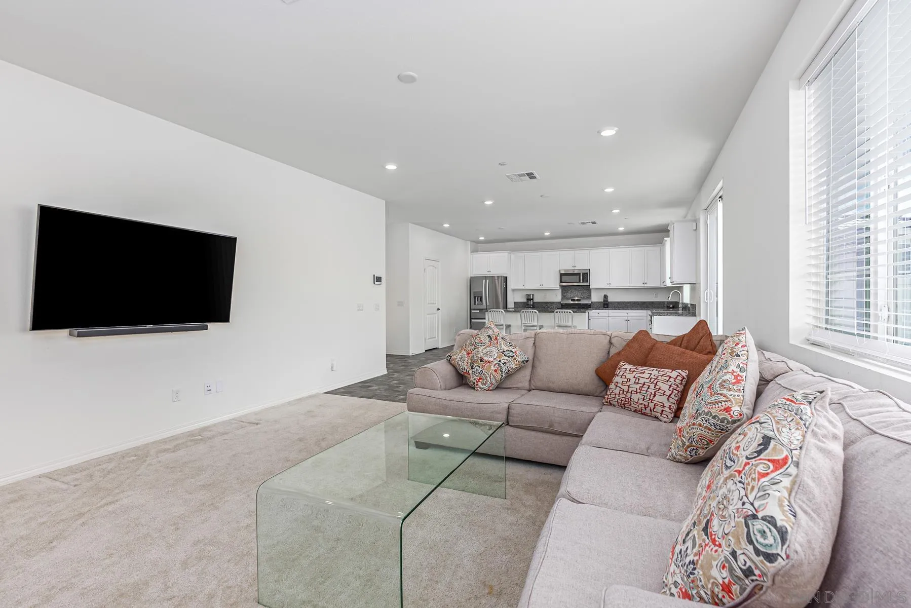 30903 Wild Berry Way Menifee, CA 92584 - Photo 5 of 37 a living room with furniture and a flat screen tv