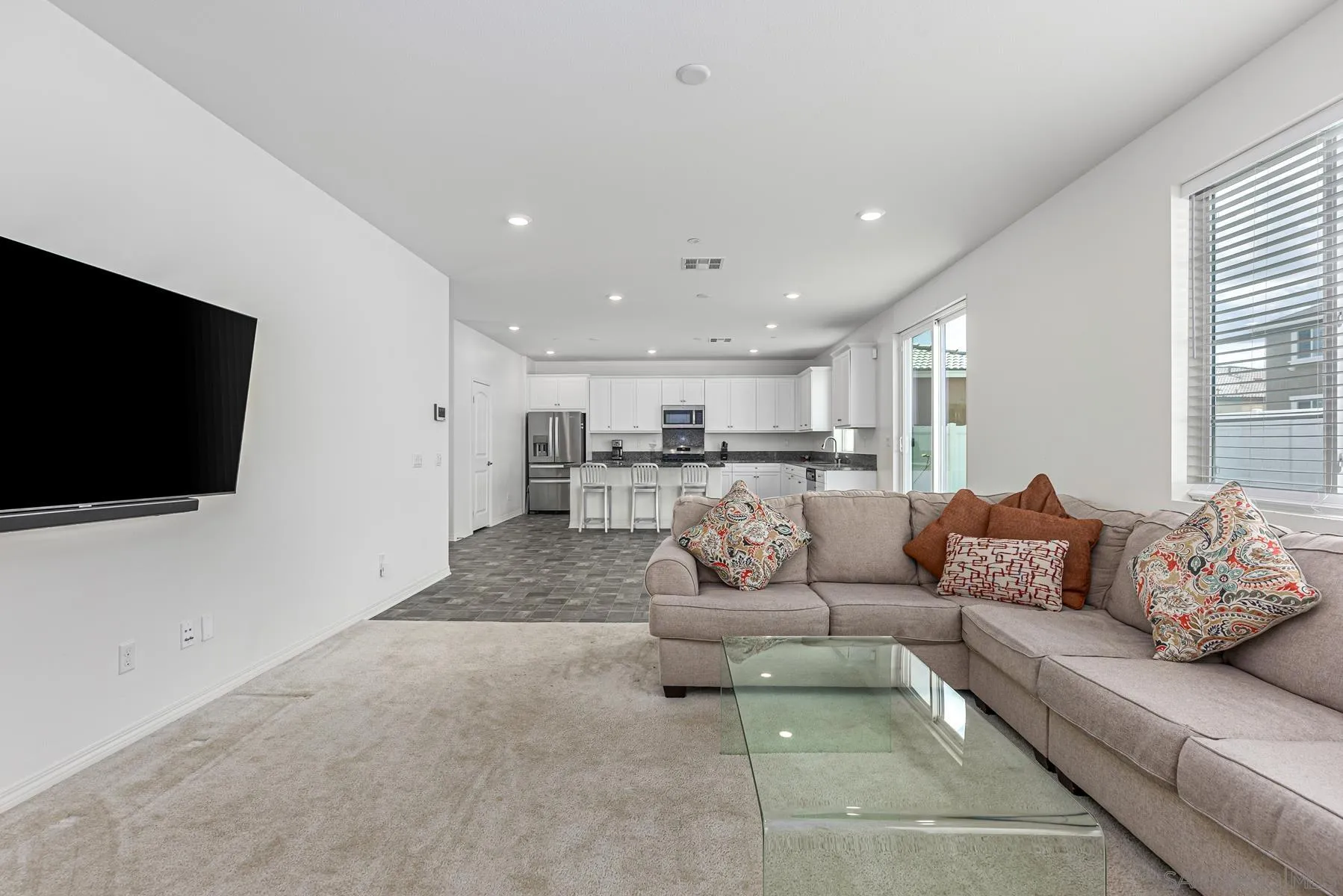 30903 Wild Berry Way Menifee, CA 92584 - Photo 6 of 37 a living room with furniture and a flat screen tv