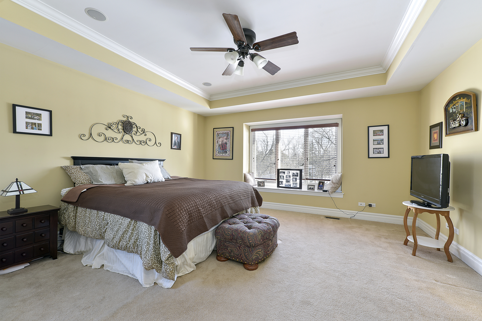 111 Haman Road Inverness, IL 60067 - Photo 11 of 19 a spacious bedroom with a bed and window