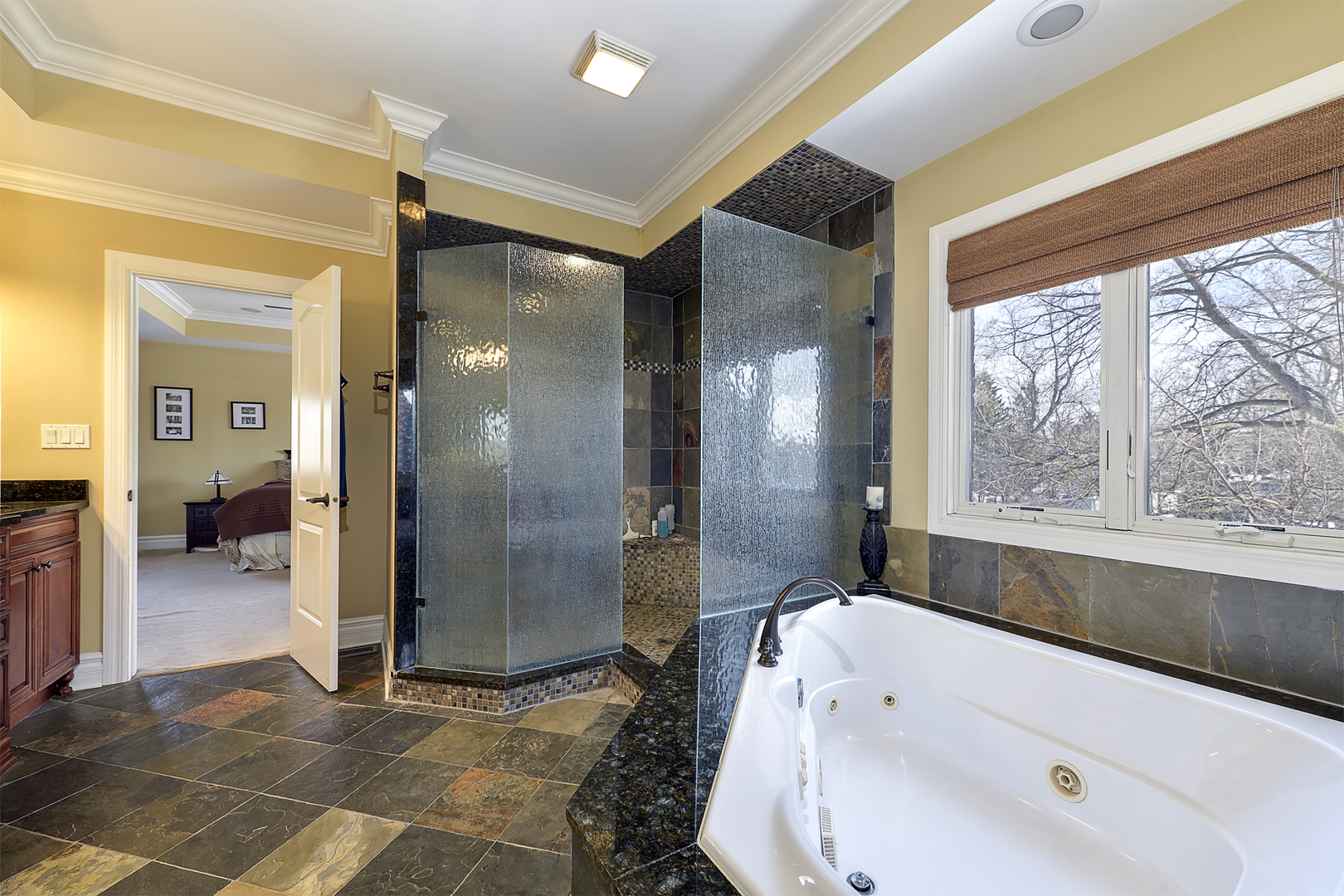 111 Haman Road Inverness, IL 60067 - Photo 12 of 19 a bathroom with a tub shower and sink