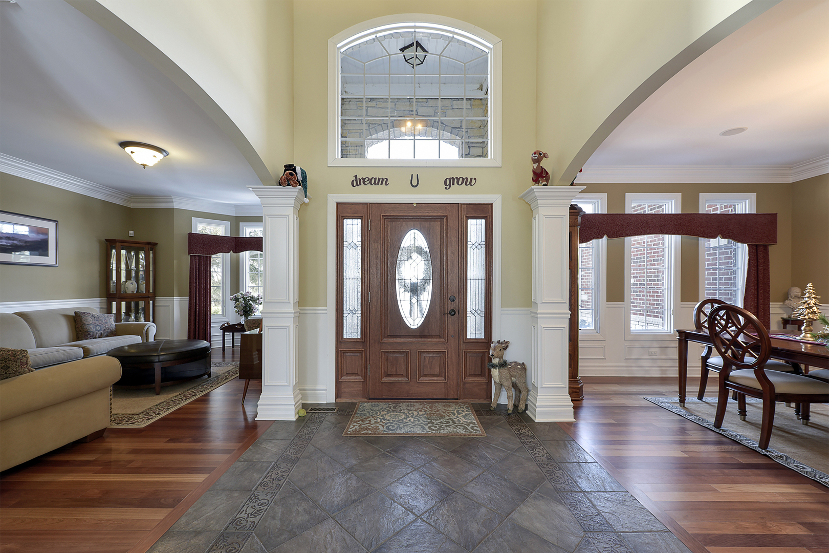111 Haman Road Inverness, IL 60067 - Photo 2 of 19 a living room with furniture a dining table with wooden floor