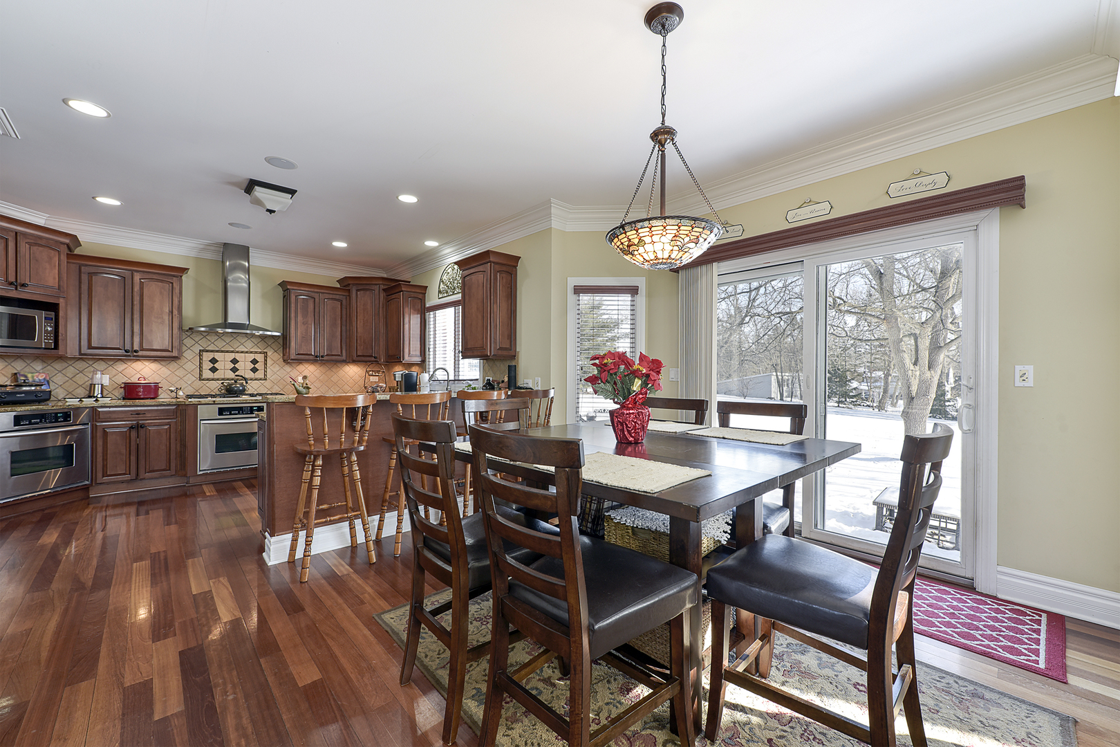 111 Haman Road Inverness, IL 60067 - Photo 5 of 19 a view of a dining room with furniture window and wooden floor