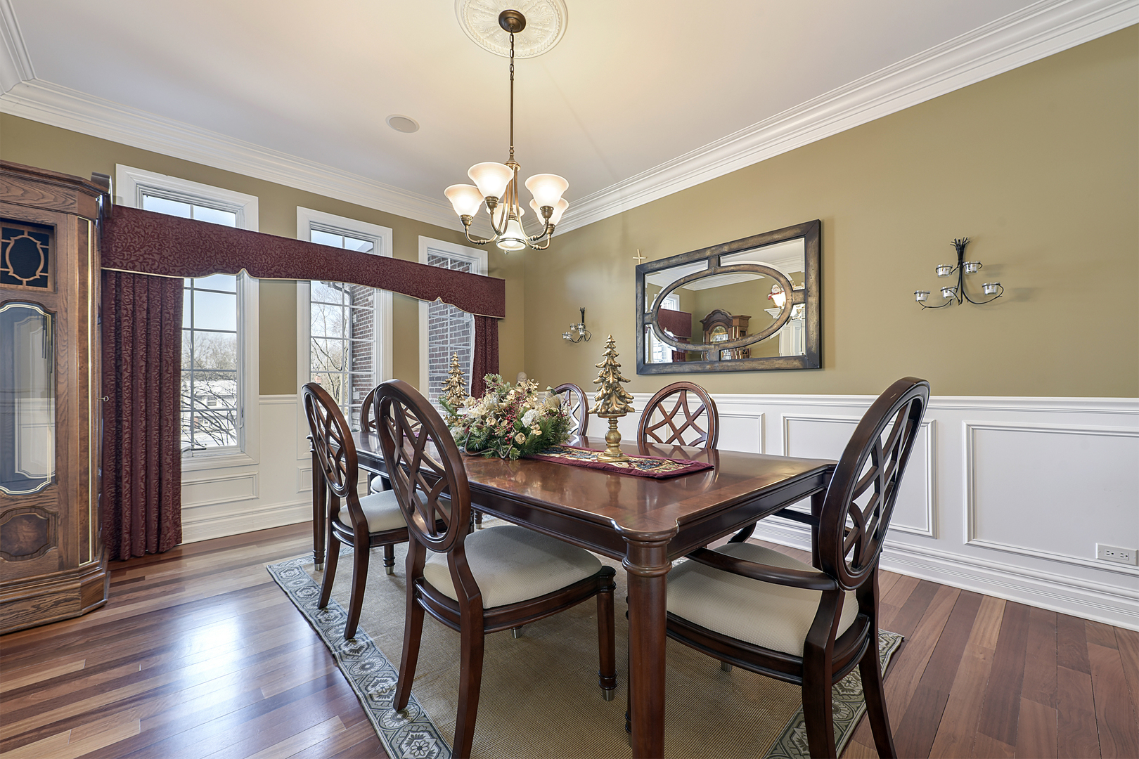 111 Haman Road Inverness, IL 60067 - Photo 7 of 19 a view of a dining room with furniture window and wooden floor