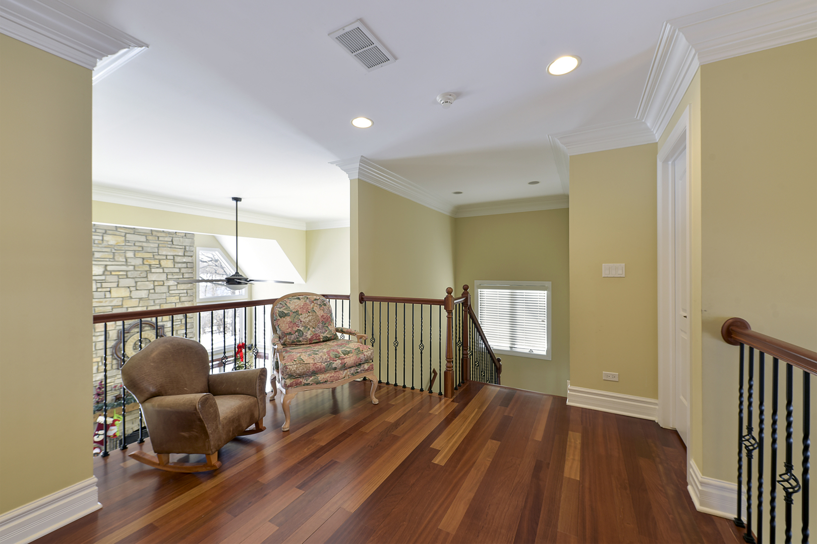 111 Haman Road Inverness, IL 60067 - Photo 10 of 19 a view of a balcony with furniture and wooden floor