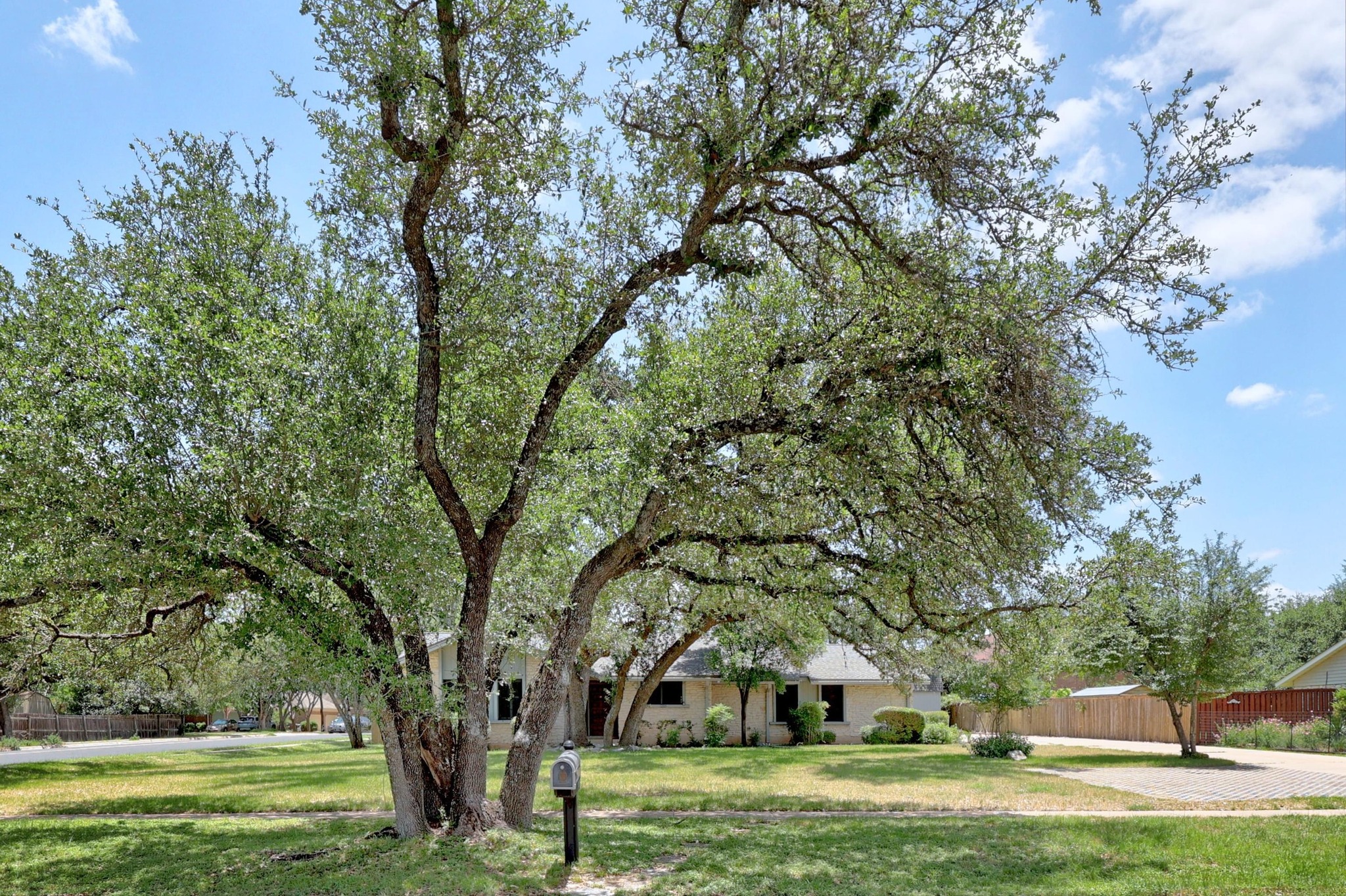 11205 D-K Ranch Road Austin, TX 78759 - Photo 2 of 35 Roomy
Corner lot. Owner provides the lawn care!