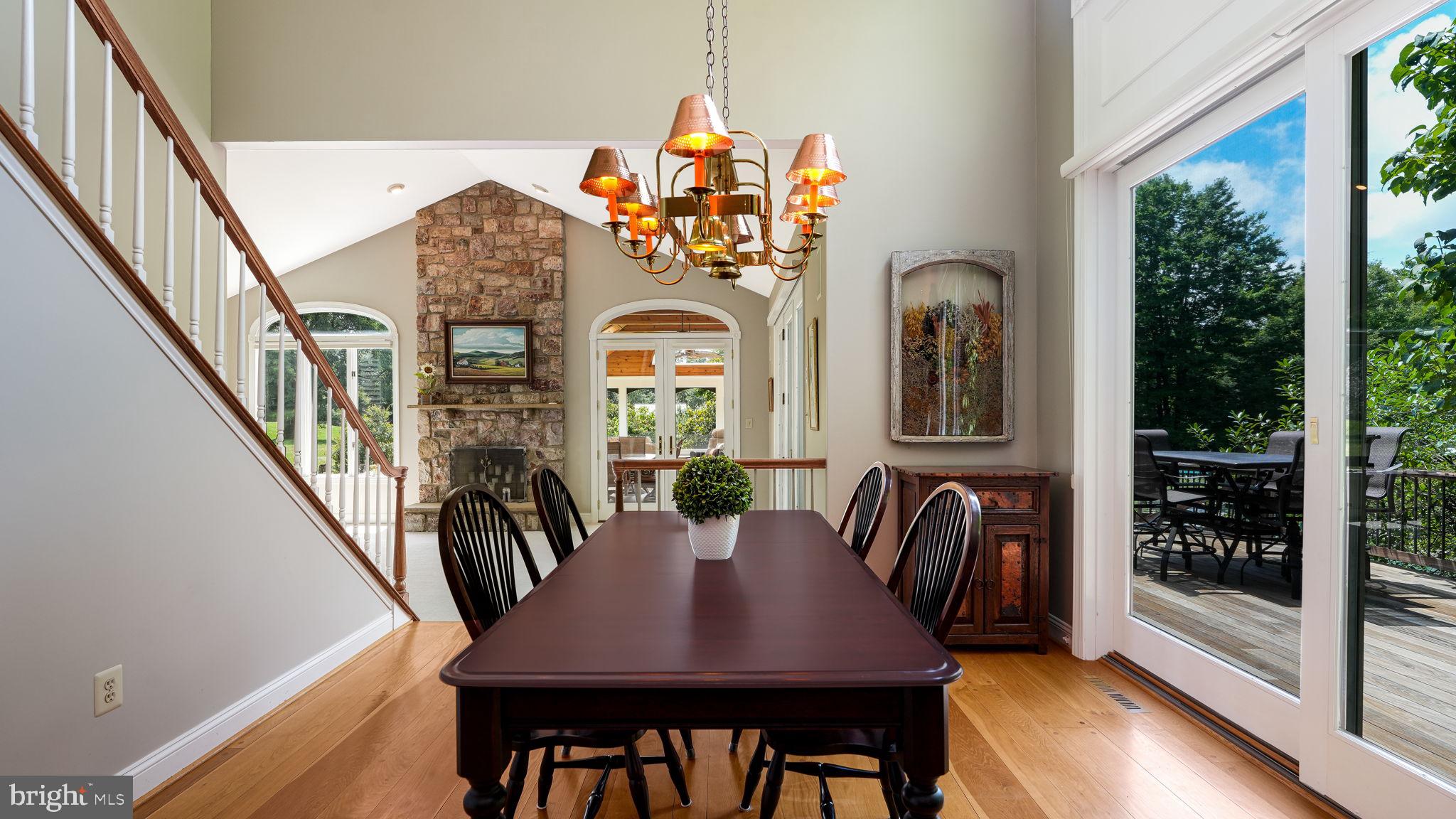 340 West Sandy Ridge Road Doylestown, PA 18901 - Photo 12 of 40 a view of a dining room with furniture and a chandelier